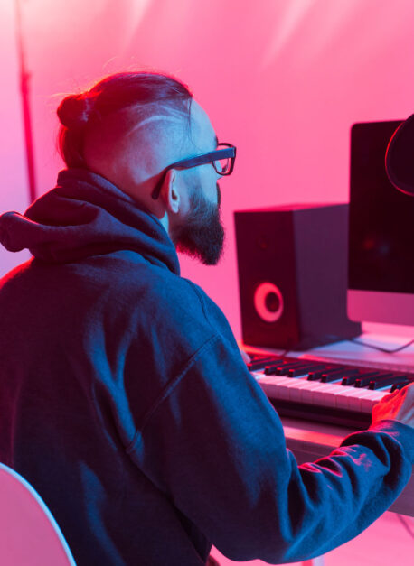 Musician and making music concept - Male sound producer working in recording studio
